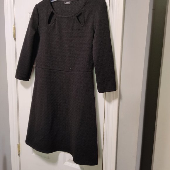 Clientele mini dress, black in color with criss cross design - Picture 1 of 4